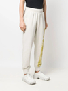 Pantalon de jogging fuselé en coton 100 % blanc cassé (400 g/m²) à imprimé graphique | Imprimé abstrait jaune intégral, taille mi-haute élastique, poches latérales - TJ004 4