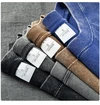 Áo thun nam màu đen, chất liệu 220 GSM, kiểu dáng vintage, in logo, được xử lý bằng phương pháp stone wash và acid wash. Nhà sản xuất 7