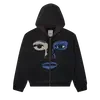 Sweat à capuche oversize en coton 600 g avec poche, orné d'appliqués brodés et délavés à l'acide. 1